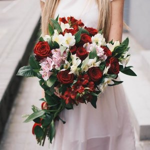 Bouquet of red roses and alstromeries